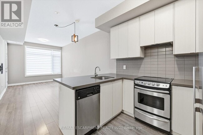 Building Photo - 457 Plains Rd E