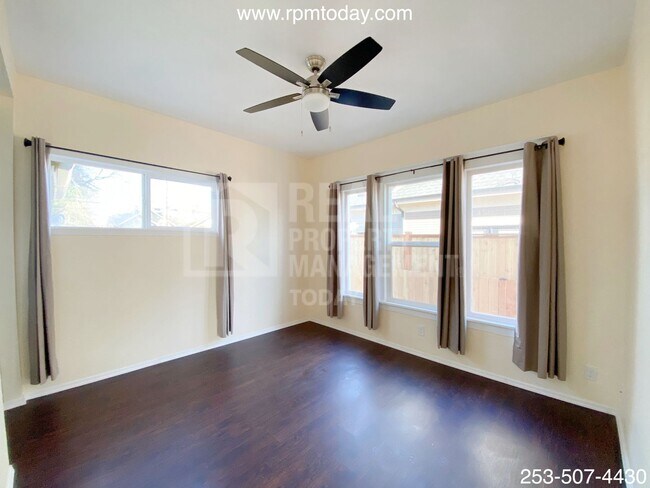 Building Photo - Updated 3 Bedroom Lower-Level Duplex in Ta...