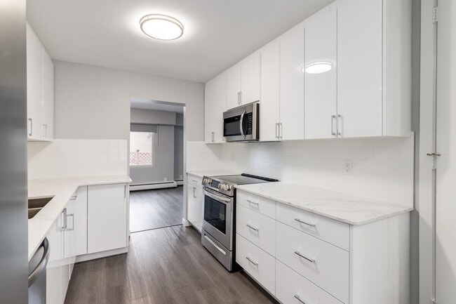 Building Photo - Glenmore Gardens Townhomes & Coachhomes