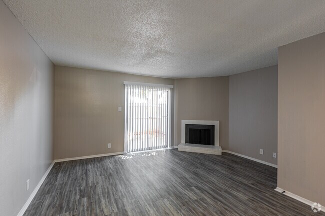 2 habitaciones, 2,5 baños - 1094 pies cuadrados - Sala de estar - Hemingway House Apartments