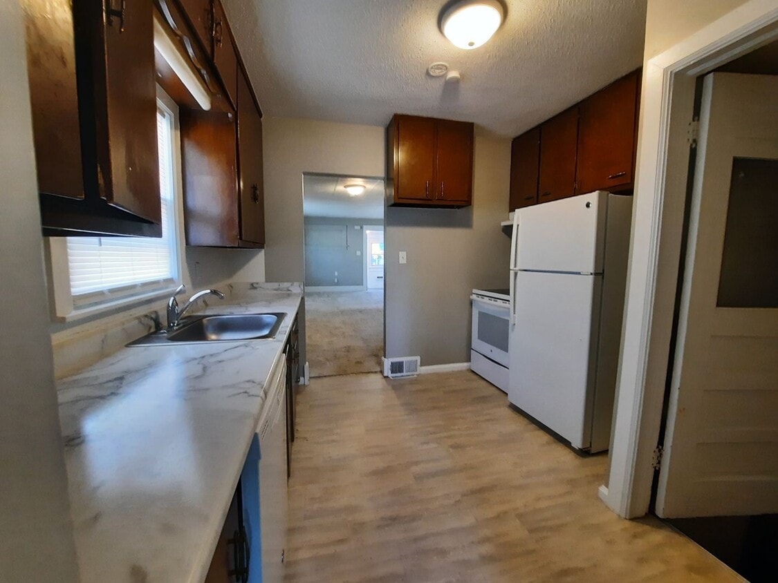 Primary Photo - 3 Bedroom Home with a Fenced Yard