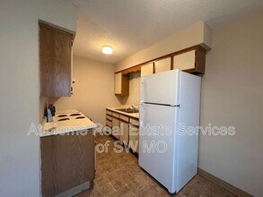 Building Photo - 1312 E McDaniel St