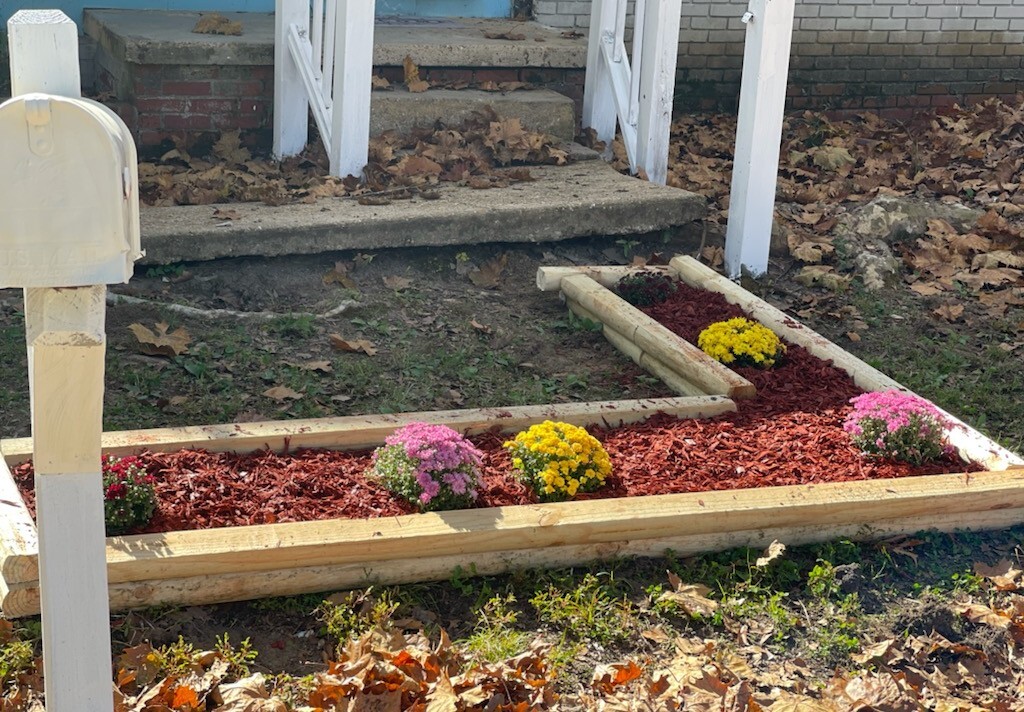 Beautiful New garden bed w/ blooming flowers - 913 Lanier Ave