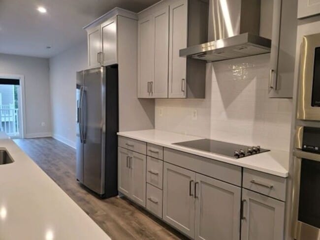 Building Photo - Like-New, Built in 2022, Gorgeous 2-story 3-Bedroom, 2.5 Bath Condo, located in the heart of Henr...