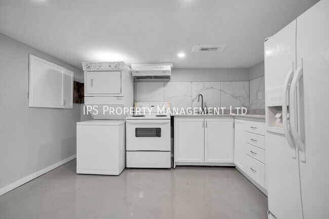 Photo du bâtiment - 2 Bed + Den | 1 Bath All inclusive