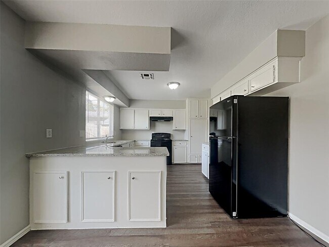 Building Photo - 11811 Rowood Dr