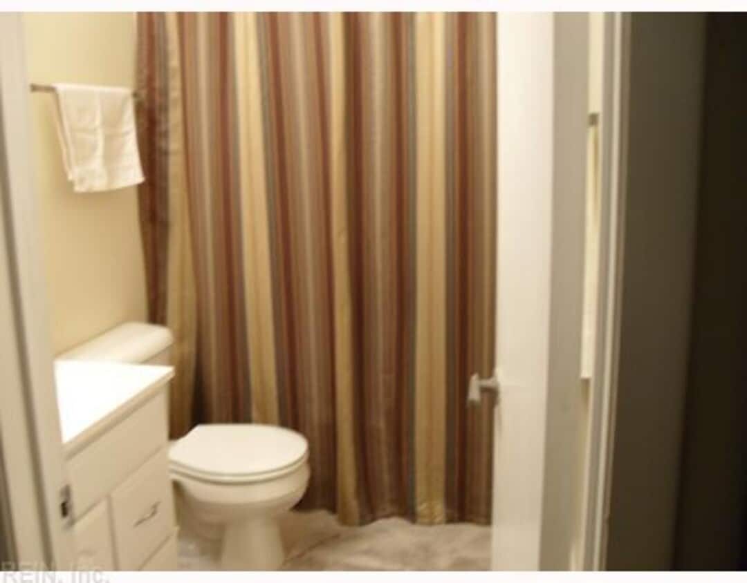 Building Photo - 8530 Tidewater Dr #308