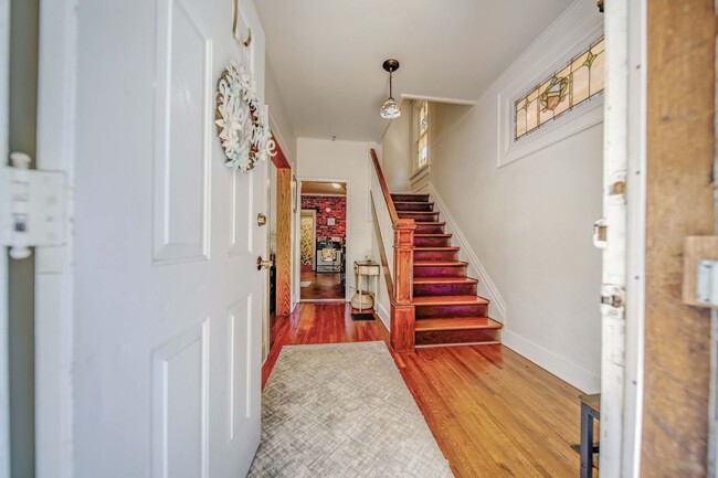 Building Photo - Charming 5-Bedroom Home with Exposed Brick...