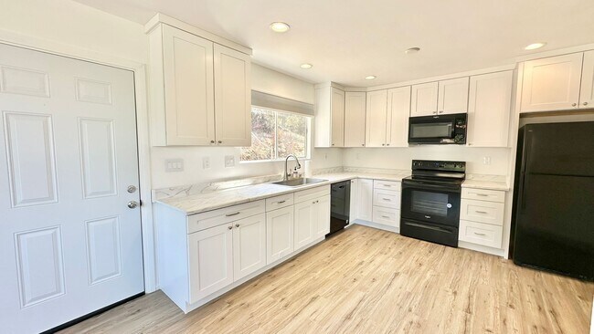 Building Photo - Nicely Updated Country Two-Story Home in t...