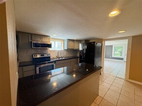 Building Photo - 4817 Ave Q 1/2