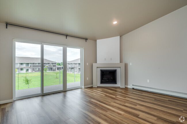 1BR, 1BA - 976SF - Living Room - THE CURRENT Roots