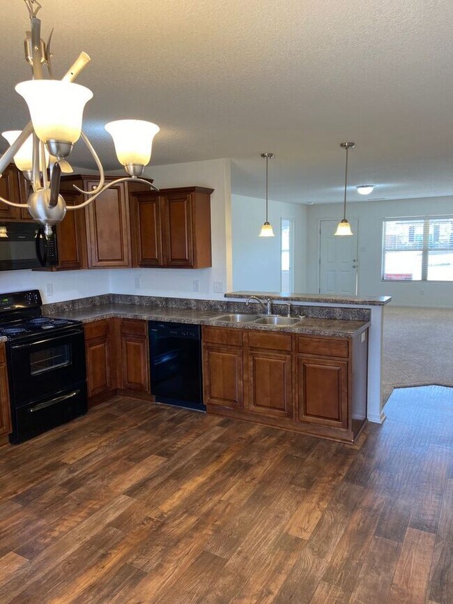 Building Photo - Four Bedroom | Two Bathroom Home
