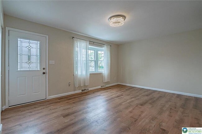 Building Photo - 5650 Greens Dr