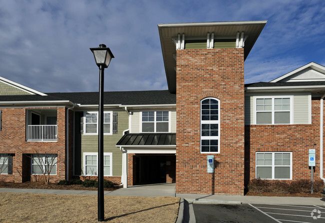 Building Photo - The Villas at Logan Gardens