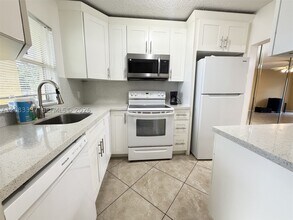 Building Photo - 9949 Sandalfoot Blvd