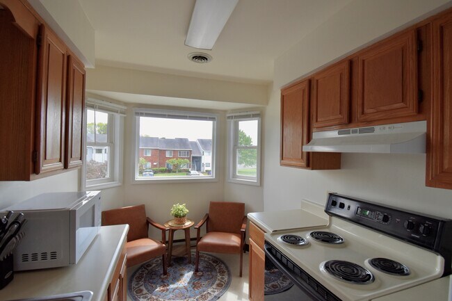 Cocina con rincón para desayunar - Strawberry Ridge Apartments