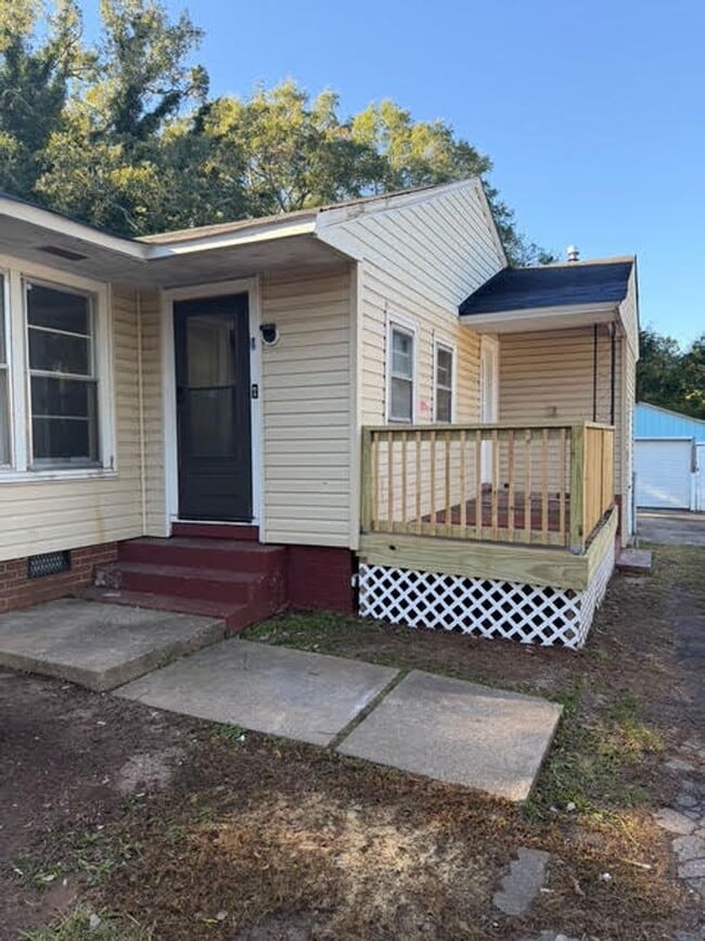 Foto del edificio - Charming 4BR/2BA House w/ Fenced back yard!