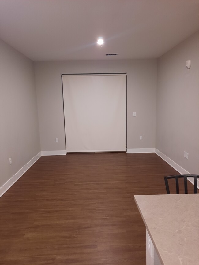 Living room with sliding door behind blinds - 86 Uinta Way