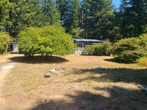 Building Photo - 55367 Pilgrim Dr