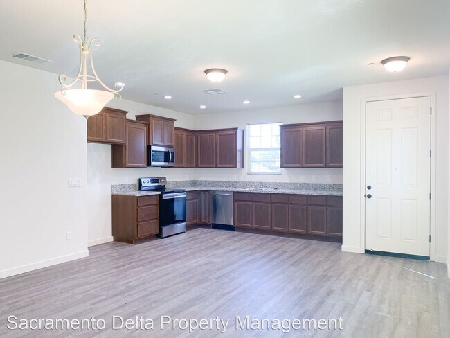 Building Photo - 6783 Mangosteen Ln