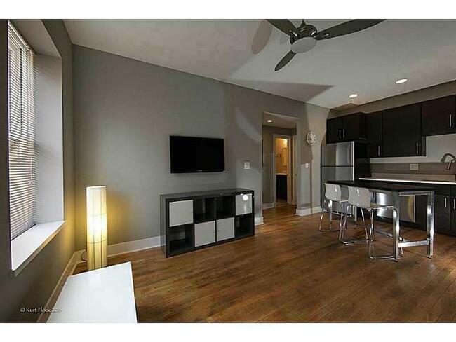 Living room with raised ceilings - 312 E 13th St