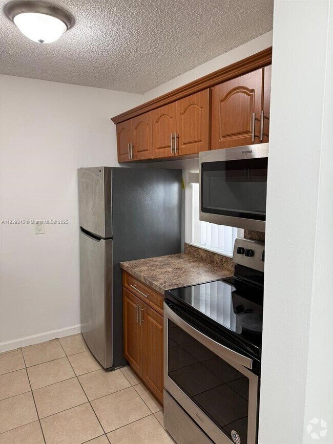 Building Photo - 8560 N Sherman Cir