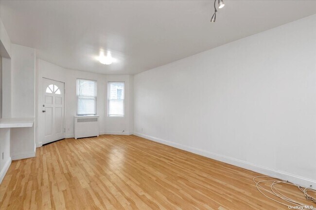 Building Photo - 60-34 Flushing Ave