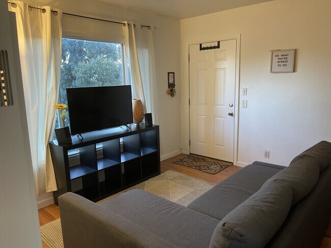 Living room with view of Sausal Creek. - 20 Peroly Ct