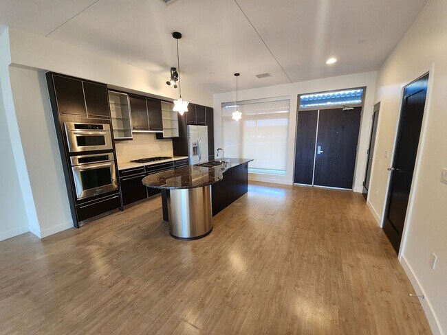 Building Photo - Exceptional Two Level 3 bedroom Condo in upscale Luxe Lofts