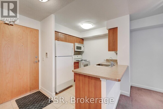 Building Photo - 4978 Yonge St