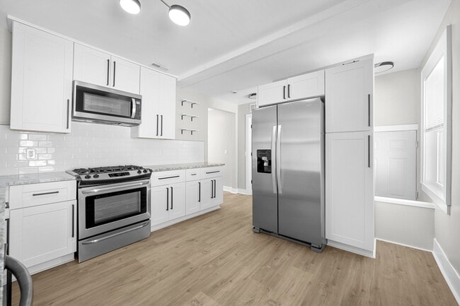 Building Photo - 8234 Orchard Ave
