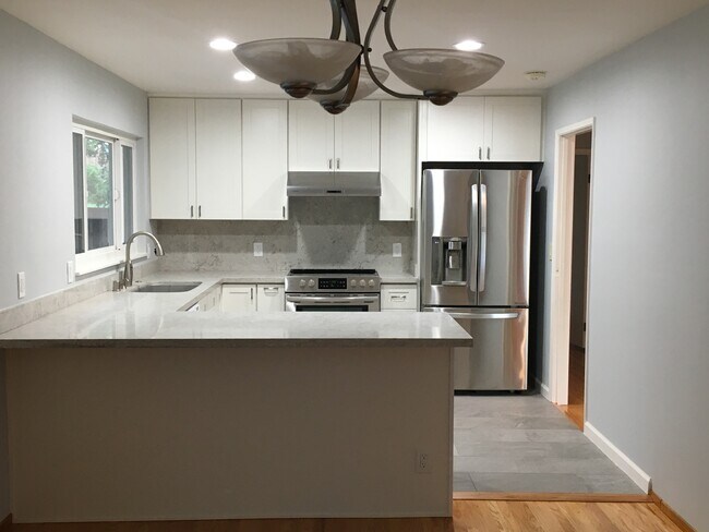 Kitchen with stainless steel appliances - 3634 Farm Hill Blvd