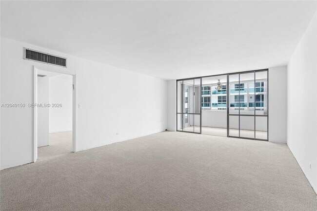 Building Photo - 5005 Collins Ave