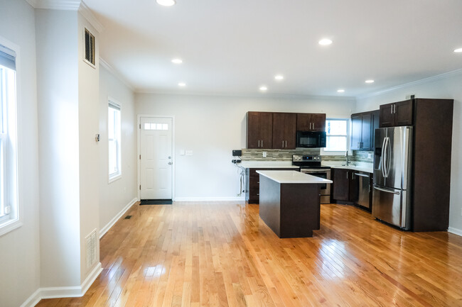 Another view of the kitchen and the back door - 655 16th St NE
