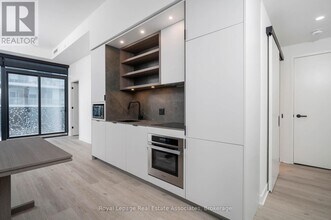 Building Photo - 55 Charles St E