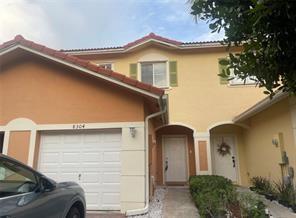 Photo - 8304 Santa Monica Avenue, Tamarac, FL 33321 - 3 BR 2.5 BA Townhouse