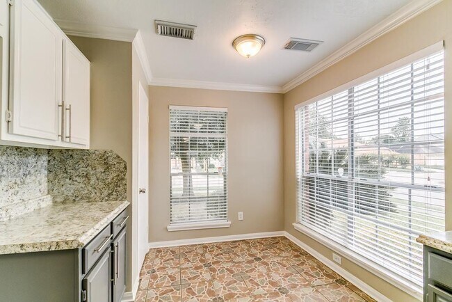 Foto del edificio - 8703 Scenic Green Dr