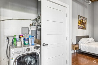 1BR, 1BA - 980SF - Laundry - The Button Lofts