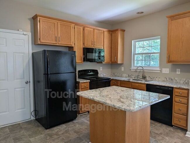 Foto del edificio - 10002 Baxter Caldwell Dr