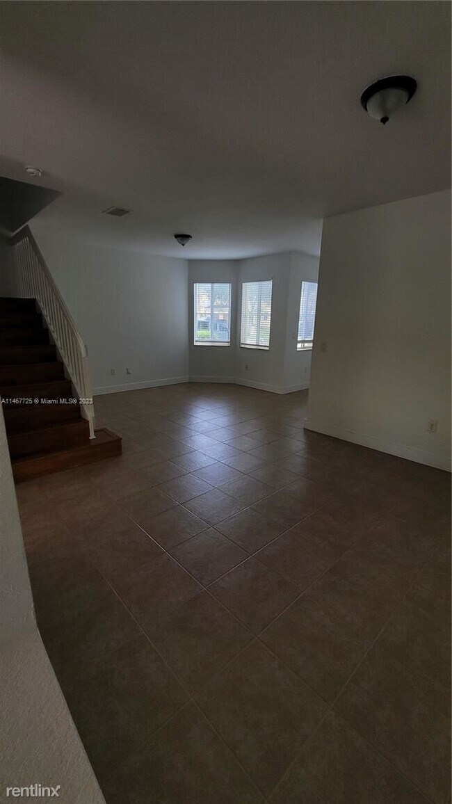Building Photo - 4 br, 2.5 bath House - 9049 SW 19th St
