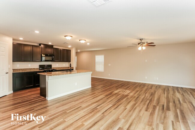 Building Photo - 6817 Vacarez Dr