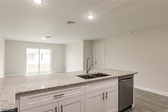 Building Photo - 3833-3835 Kitty Hawk Dr