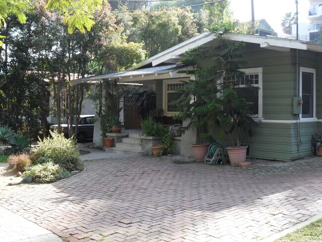 Wide brick driveway. - 2113 Holly Dr