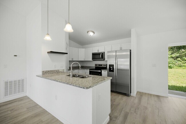 Building Photo - 3BR/2BA Home | Granite Counters, LVP Flooring, Washer/Dryer & Large Yard