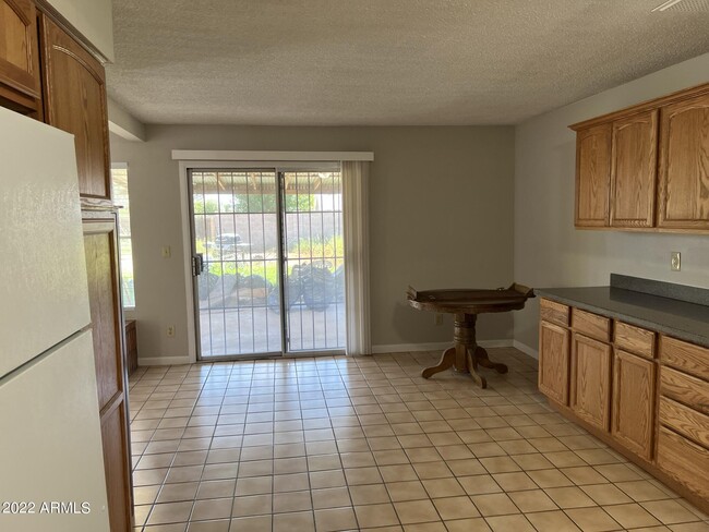 Building Photo - 7827 W College Dr