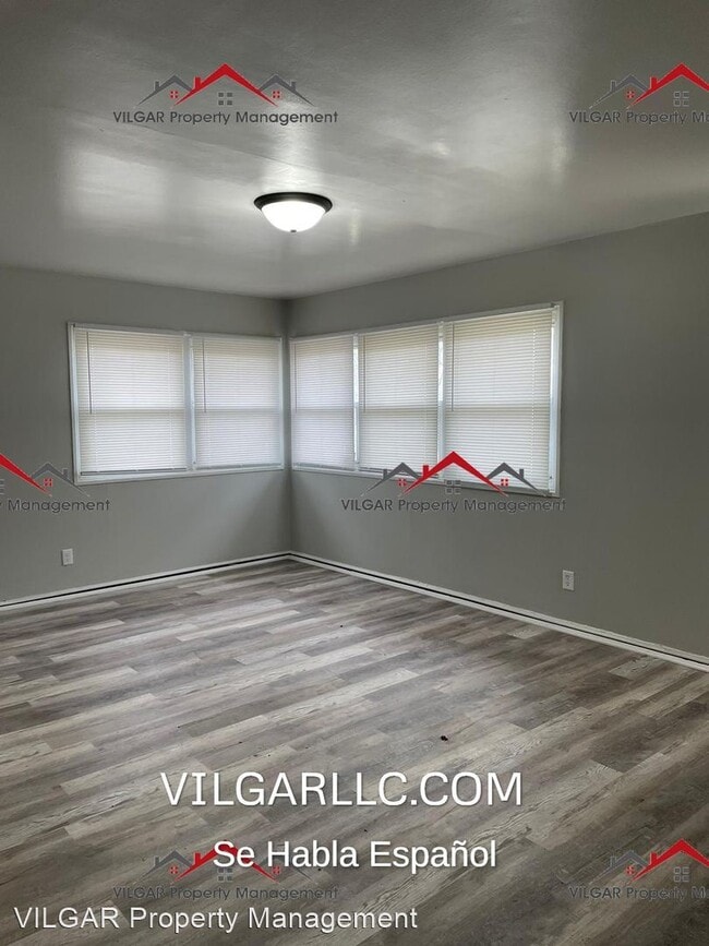 Building Photo - 3 br, 1 bath House - 4401 W 21st Pl