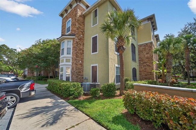 Building Photo - 9916 Courtney Palms Blvd