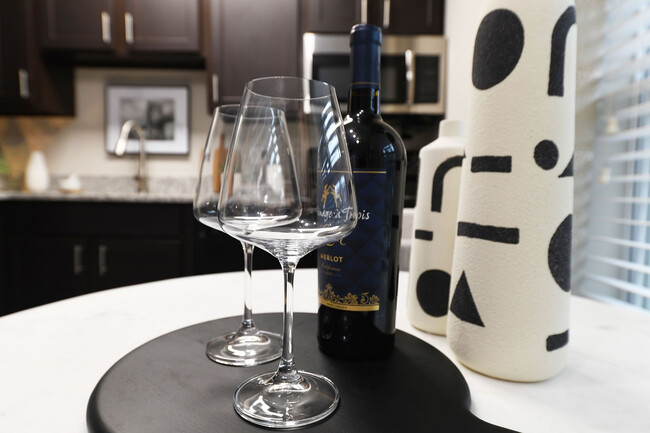 Experience sophistication in your culinary space with this contemporary kitchen setting. - Element at Cedar Bluff