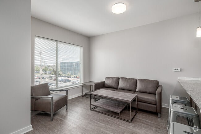 1BR, 1BA - 700SF - Living Room - 900 East Fayette Group, LLC