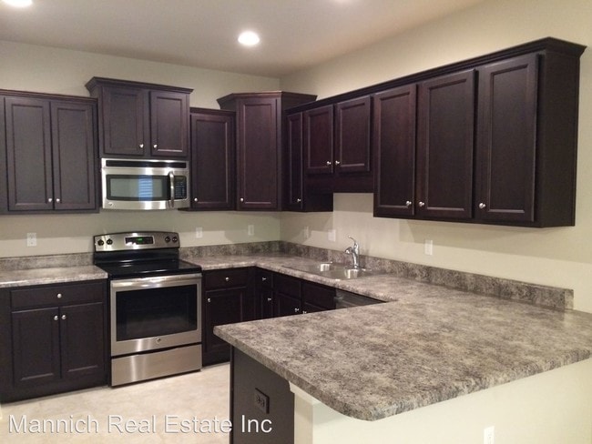 Building Photo - 4 br, 2.5 bath House - 150 Athene St.